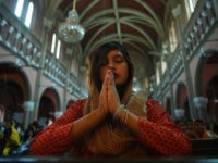 Pakistani Christians attend the Easter Sunday service at the Sacred Heart Cathedral Church in Lahore on April 16, 2017. / AFP PHOTO / ARIF ALI (Photo credit should read ARIF ALI/AFP/Getty Images)