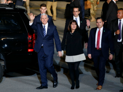 US Vice President Mike Pence waves after stepping off a plane with his wife Karen Pence upon their arrival at Ben Gurion Airport near the Israeli city of Tel Aviv on January 21, 2018 on the second day of his delayed Middle East tour after visiting Egypt and Jordan. / …