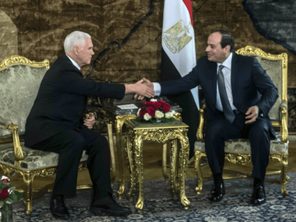 U.S. Vice President Mike Pence shakes hands with Egyptian President Abdel-Fattah el-Sissi, right, at the Presidential Palace in Cairo, Egypt, Saturday, Jan. 20, 2018. Pence arrived in Cairo hours after the U.S. Congress and President Donald Trump failed to reach agreement on a plan to avert a partial federal closure. …