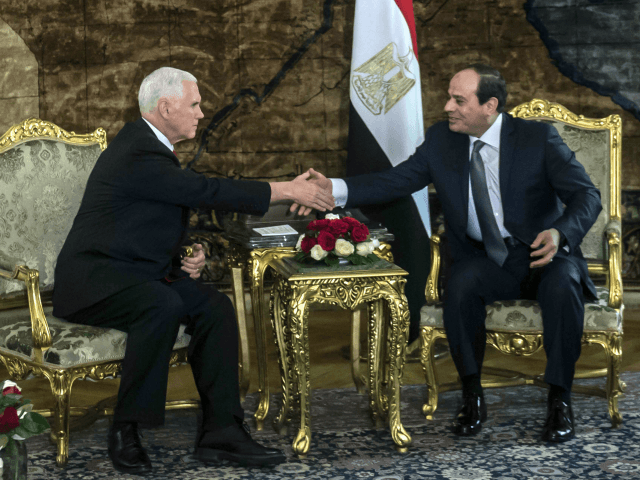 U.S. Vice President Mike Pence shakes hands with Egyptian President Abdel-Fattah el-Sissi,