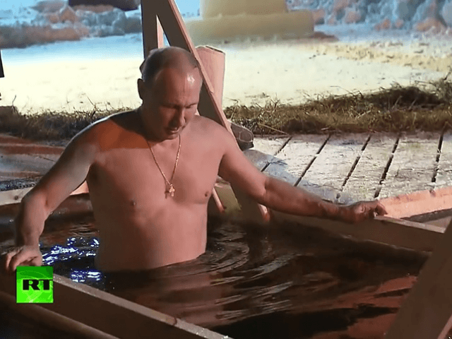 President Vladimir Putin waded into a frozen lake in a traditional celebration of Epiphany