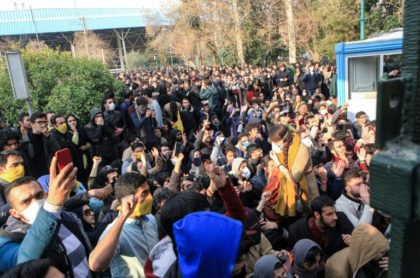 Iranian students protest at the University of Tehran during a demonstration in the capital Tehran on December 30, 2017