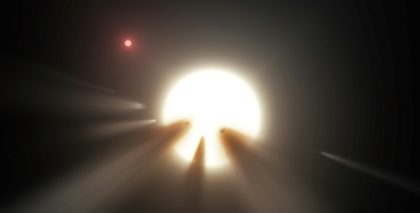 NASA image obtained January 3, 2018 shows an illustration of a star behind a shattered com