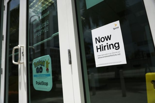 Even with the US economy in its eighth year of recovery, and solid hiring pushing the unemployment rate to a 17-year low, wage gains have been far more sluggish than expected. This file photo taken on July 7, 2017 shows a sign at a Miami business