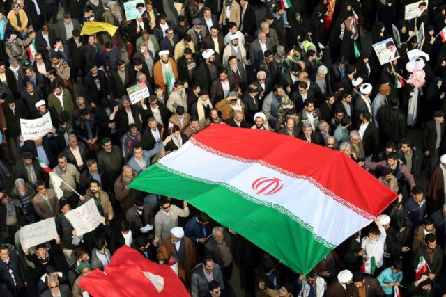 Iranians rally in support of the government in the city of Mashhad on January 4, 2018, aft