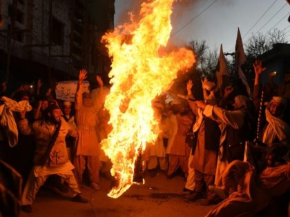 Pakistani demonstrators burn the US flag at a protest in Quetta on Jan 4 as Washington esc