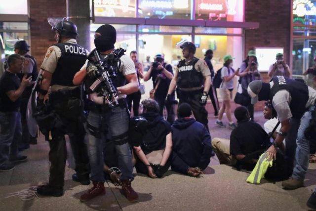 Police arrest demonstrators in St. Louis who were protesting the acquittal of a police off