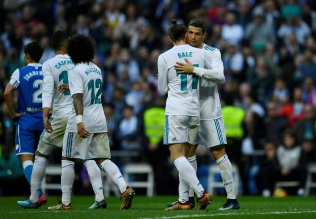 Real Madrid defy crisis talk with Deportivo hammering