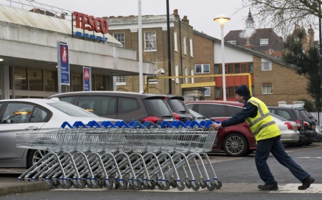 Tesco restructures management, leading to job cuts