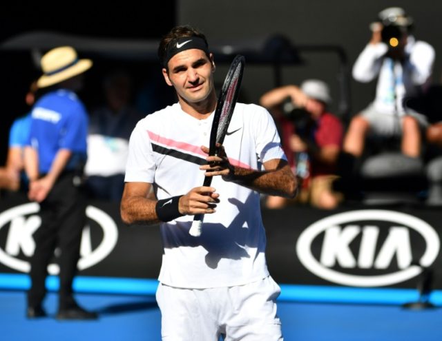 Cool Federer and happy Halep romp into quarters