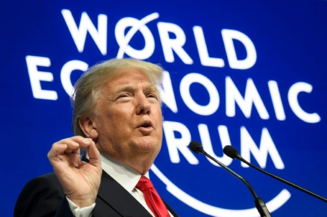 Trump woos Davos with pacific trade deal shift