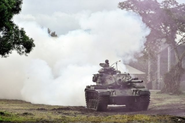 Taiwan holds live-fire drills as China tensions mount