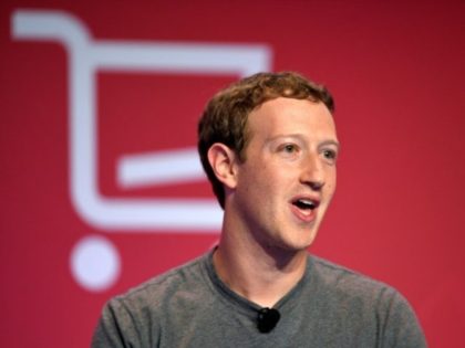 Facebook shares slip despite jump in earnings
