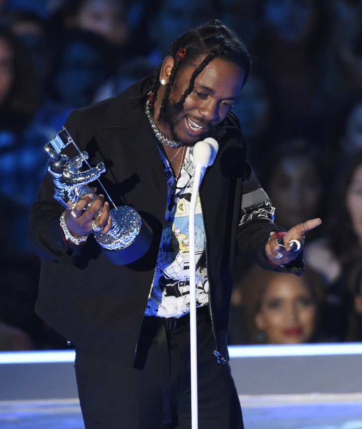 The Latest Kendrick Lamar opens Grammys with song 'XXX' Breitbart