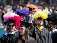 AP_17135619163870 A student gestures during the University of Pennsylvania commencement ceremony, in Philadelphia, Monday, May 15, 2017.