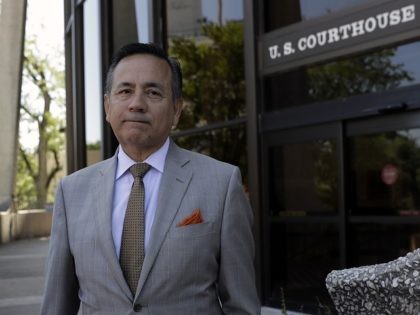Texas Sen. Carlos Uresti, D-San Antonio. right, leaves the federal courthouse for a hearing, Monday, July 10, 2017, in San Antonio. (AP Photo/Eric Gay)