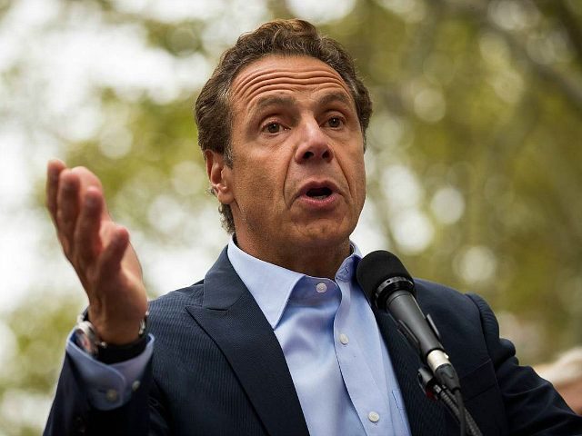 NEW YORK, NY - SEPTEMBER 18: New York Governor Andrew Cuomo speaks during a rally of hundr