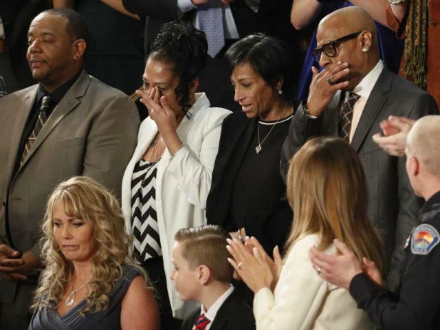 From top left, Robert Mickens, Elizabeth Alvarado, Evelyn Rodriguez, Freddy Cuevas, parents of two Long Island teenagers who were believed to have been killed by MS-13 gang members, during the State of the Union address Jan. 30, 2018. (AP)