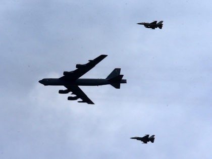 WADI SHADIYAH, JORDAN- MAY 18: A B-52 Stratofortress and F-16 jets arrive to participate in the final counter attack at Jordanian exercises with 18 nations including the U.S. as part of Eager Lion on May 18, 2015 in the southeast desert of Wadi Shadiyah, Jordan. In the final exercise, two …