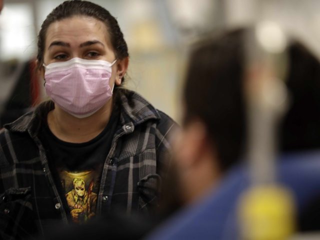 California flu (Gregory Bull / Associated Press)