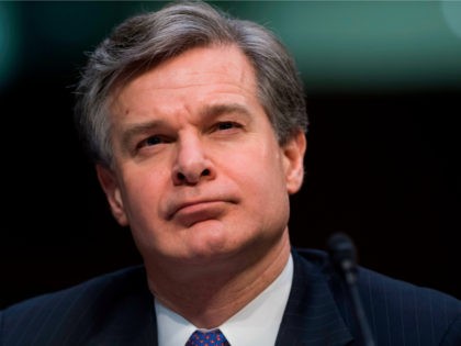 FBI Director Christopher Wray testifies on worldwide threats during a Senate Intelligence Committee hearing on Capitol Hill in Washington, DC, February 13, 2018. / AFP PHOTO / SAUL LOEB (Photo credit should read SAUL LOEB/AFP/Getty Images)