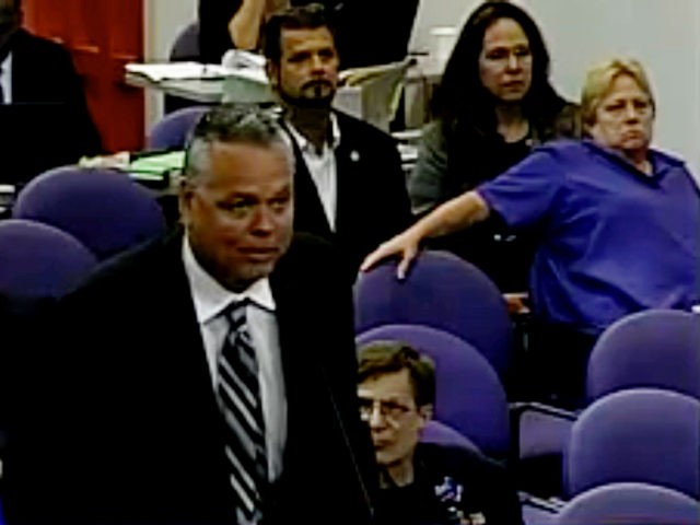 This Feb. 18, 2015 image taken from video provided by Broward County Public Schools shows school resource officer Scot Peterson during a school board meeting of Broward County, Fla. During the shootings at Marjory Stoneman Douglas High School on Feb. 14, 2018, Peterson took up a position viewing the western …