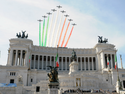 The Frecce Tricolore air squadron flies over the munment dedictaed to Vittorio Emanuele II, the Altar of the Fatherland, prior a military parade to mark the anniversary of the founding of the Italian republic in 1946 and the 150th anniversary of Italian unification attended by world leaders on June 2, …