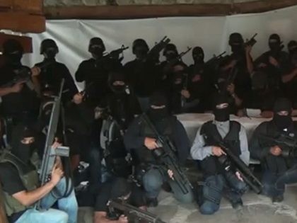 Screen capture of a paramilitary group which vowed to "eliminate" the Zetas, reputedly Mexico's most violent drug gang, in a video posted on the Internet on July 27, 2011 several days after 49 bodies were found on the streets of Veracruz. The video, according to its creators, shows a group …