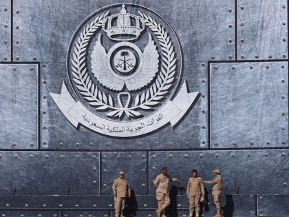 TOPSHOT - Army officers stand under the Saudi Air Force logo during a ceremony marking the 50th anniversary of the creation of the King Faisal Air Academy at King Salman airbase in Riyadh on January 25, 2017. / AFP / FAYEZ NURELDINE (Photo credit should read FAYEZ NURELDINE/AFP/Getty Images)