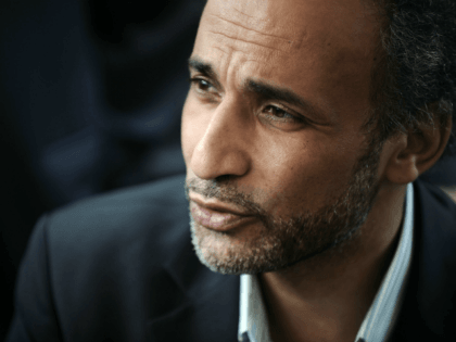Muslim French intellectual Tariq Ramadan participates in a conference untitled 'living together' on April 25, 2010 at El Arhama mosque in Nantes, western France. Ramadan said that French Interior minister Brice Hortefeux 'betrays French values' by saying that a French muslim, companion of a woman fined for driving wearing a …