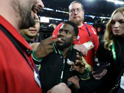 Comedian and Philidelphia native Kevin Hart attempts to get onto the stage following the Eagles 41-33 win over the New England Patriots in Super Bowl LII at U.S. Bank Stadium on February 4, 2018 in Minneapolis, Minnesota. (Photo by Elsa/Getty Images)