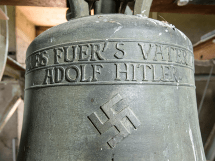 The church bell embossed with a swastika and the text: 'Everything for the Fatherland Adolf Hitler' in the Jakobskirche village church pictured on June 13, 2017 in Herxheim, Germany. For 82 years the 1930s-era church bell, cast when Germany was ruled by Adolf Hitler, hung in the 1,000-year-old church tower …
