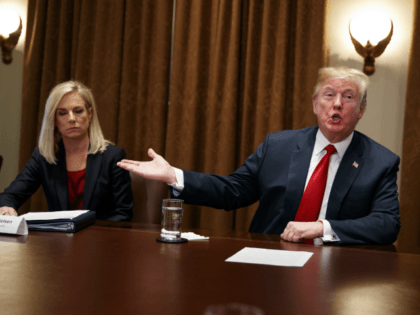 Secretary of Homeland Security Kirstjen Nielsen listens as President Donald Trump speaks during a meeting with law enforcement officials on the MS-13 street gang and border security, in the Cabinet Room of the White House, Tuesday, Feb. 6, 2018, in Washington. (AP Photo/Evan Vucci)