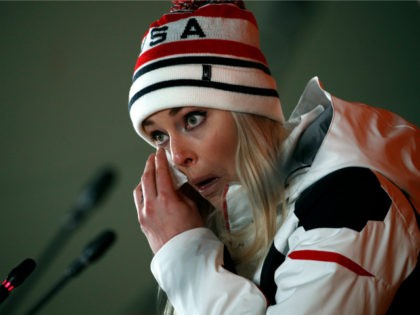 United States' Lindsey Vonn wipes her face while speaking at a press conference after winning the bronze medal in the women's downhill at the 2018 Winter Olympics in Jeongseon, South Korea, Wednesday, Feb. 21, 2018. (AP Photo/Christophe Ena)
