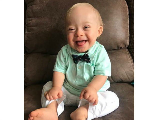 14-month-old Lucas Warren of Dalton, Ga. won over executives at Gerber baby food who have made him their "spokesbaby" this year. Lucas is Gerber's first spokesbaby with Down syndrome in the company's 91-year history. (Courtesy Warren family/Gerber via AP)