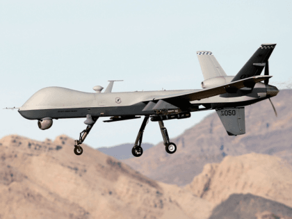 An MQ-9 Reaper remotely piloted aircraft (RPA) flies by during a training mission at Creech Air Force Base on November 17, 2015 in Indian Springs, Nevada. The Pentagon has plans to expand combat air patrols flights by remotely piloted aircraft by as much as 50 percent over the next few …