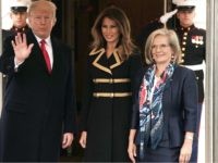 MelaniaCoat1 U.S. President Donald Trump (2nd L) and first lady Melania Trump (3rd L) welcome Australian Prime Minister Malcolm Turnbull (L) and his wife Lucy Turnbull (R) during an arrival at the South Lawn of the White House February 23, 2018 in Washington, DC. Prime Minister Turnbull is on a visit …