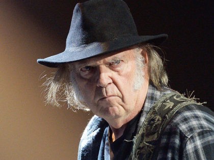 HOLLYWOOD, CA - MAY 21: Musician Neil Young performs onstage at the 4th Annual Light Up The Blues at the Pantages Theatre on May 21, 2016 in Hollywood, California. (Photo by Kevork Djansezian/Getty Images for Autism Speaks)