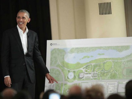 Former President Barack Obama points out features of the proposed Obama Presidential Center, which is scheduled to be built in nearby Jackson Park, during a gathering at the South Shore Cultural Center on May 3, 2017 in Chicago, Illinois. The Presidential Center design envisions three buildings, a museum, library and …