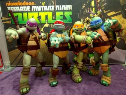 Nickelodeon's Teenage Mutant Ninja Turtles emerge at the NY Comic Con 2012 at Jacob Javitz Center on October 11, 2012 in New York City. (Photo by Neilson Barnard/Getty Images for Nickelodeon)