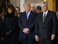 Donald Trump, Melania Trump, Franklin Graham First lady Melania Trump, President Donald Trump, and Franklin Graham pray during a ceremony honoring Reverend Billy Graham in the Rotunda of the U.S. Capitol building, Wednesday, Feb. 28, 2018, in Washington. (AP Photo/Evan Vucci)
