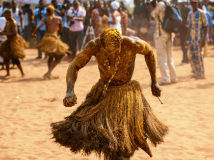 A Voodoo devotee in a trance performs at the annual Voodoo Festival on January 10, 2017 in Ouidah. Officially declared a religion in Benin in 1996, Voodoo and the Voodoo festival attracts thousands of devotees and tourists for a day filled with ritual dances and gin drinking. Benins voodoo festival …