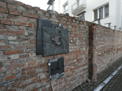 A fragment of the former Warsaw Ghetto wall in Sienna 53 street that regional official for preservation of historical sites wants put on a list of protected historical monuments, in Warsaw, Poland, Tuesday, Feb. 20, 2018. The wall was built in 1940, when the Nazi Germans closed the area of …