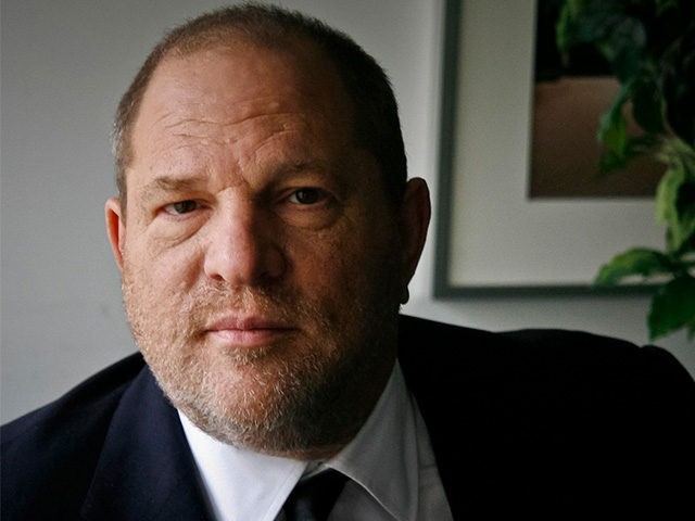 FILE - In this Nov. 23, 2011 file photo, film producer Harvey Weinstein poses for a photo