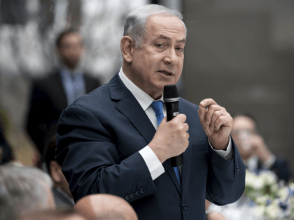 Likud Israel's Prime Minister Benjamin Netanyahu speaks at the Security Conference in Munich, Germany, Friday, Feb. 16, 2018. (Sven Hoppe/dpa via AP)