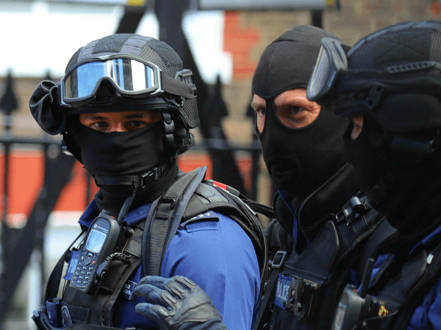 LONDON, ENGLAND - JUNE 04: Counter terrorism officers are seen near the scene of last nigh