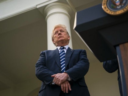 WASHINGTON, DC - OCTOBER 16: President Donald Trump listens as Senate Majority Leader Mitch McConnell of Ky., speaks in the Rose Garden after their meeting at the White House in Washington, DC on Monday, Oct. 16, 2017. (Photo by Jabin Botsford/The Washington Post via Getty Images)