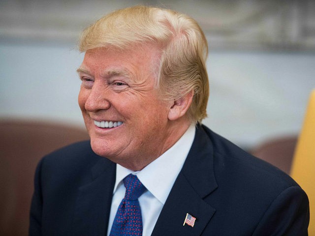 US President Donald Trump smiles during his meeting with his Kazakh counterpart Nursultan Nazarbayev in the Oval office at the White House in Washington, DC, on January 16, 2018. / AFP PHOTO / NICHOLAS KAMM (Photo credit should read NICHOLAS KAMM/AFP/Getty Images)