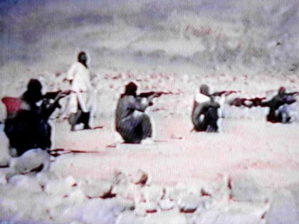 A video grab dated 19 June 2001 shows members of Saudi dissident Osama bin Laden's Al-Qaed