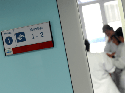 Doctors and nurses take care of a baby at the Bambino Gesu hospital on March 23, 2012 in R
